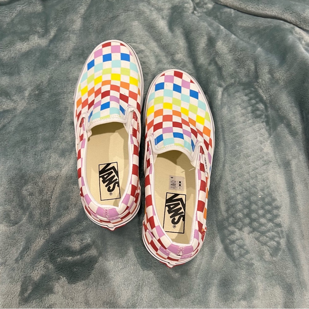 VANS women’s 7.5 checkered slip ons.